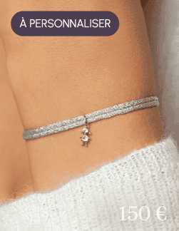 Bracelet cordon scintillant pendentif silhouette Topazes blanches
